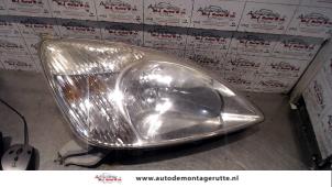 O74615 Gebruikte koplamp rechts Toyota Prius