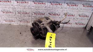 O124569 Gebruikte dynamo Daihatsu Charade