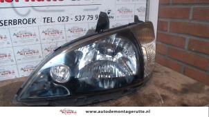 O73027 Gebruikte koplamp links Daihatsu Young RV