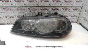 O72166 Gebruikte linker koplamp Alfa Romeo 156