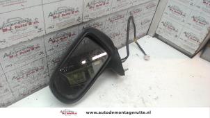 O84787 Gebruikte buitenspiegel links Mazda Premacy