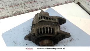 O124235 Gebruikte dynamo Mazda 323F
