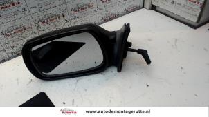 O85737 Gebruikte buitenspiegel links Toyota Starlet