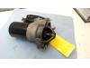 Startmotor van een Renault Megane II CC (EM) 2.0 16V 2004