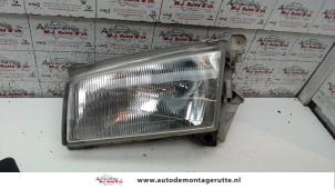 O72307 Gebruikte koplamp links Mazda Demio