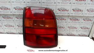 O93339 Gebruikte achterlicht links Nissan Micra