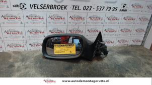 O84387 Gebruikte spiegel buiten links Opel Astra