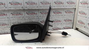 O84794 Gebruikte buitenspiegel links Mazda 121