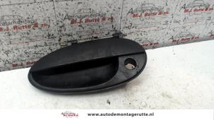 O80285 Gebruikte deurgreep 4deurs links-voor Daewoo Matiz