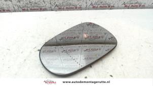 O86217 Gebruikte spiegelglas links Renault Clio