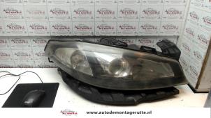 O74275 Gebruikte rechter koplamp Renault Laguna
