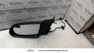 O84427 Gebruikte buitenspiegel links Opel Zafira