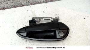 O79775 Gebruikte portiergreep 2deurs links Fiat Punto Grande