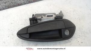 O80133 Gebruikte portiergreep 4deurs links-voor Fiat Punto Grande
