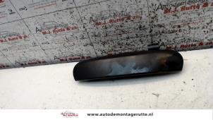 O79956 Gebruikte portiergreep 2deurs links Mitsubishi Colt