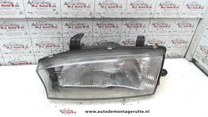 O72485 Gebruikte koplamp links Subaru Legacy