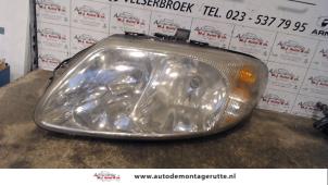 O72335 Gebruikte linker koplamp Chrysler Voyager