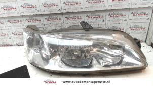 O74123 Gebruikte koplamp rechts Peugeot 306