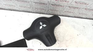 O113112 Gebruikte airbag links (stuur) Mitsubishi Colt