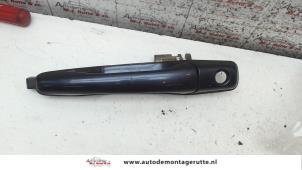O80410 Gebruikte deurgreep 4deurs links-voor Mitsubishi Grandis