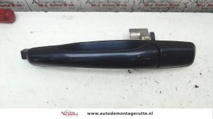 O89481 Gebruikte portiergreep 4deurs links-achter Mitsubishi Grandis