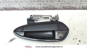 O80139 Gebruikte portiergreep 4deurs links-voor Fiat Punto Evo