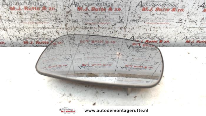 Gebruikte Spiegelglas links Opel Astra O85885