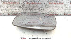 O85885 Gebruikte spiegelglas links Opel Astra