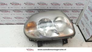 O74230 Gebruikte rechter koplamp Renault Clio