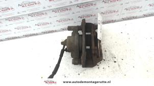 O112008 Gebruikte remklauw (tang) links-voor Mazda 6.
