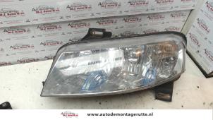 O72212 Gebruikte koplamp links Fiat Stilo