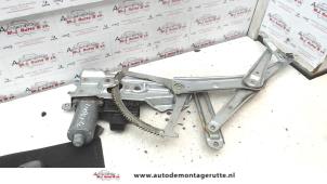 O77991 Gebruikte ruitmechaniek 4deurs links-voor Opel Astra