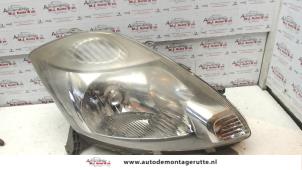 O74477 Gebruikte rechter koplamp Daihatsu Sirion
