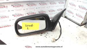 O84914 Gebruikte spiegel buiten links Nissan Primera