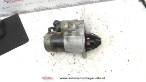 O128243 Gebruikte startmotor Mazda 323F