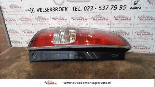 O94082 Gebruikte achterlicht links Daihatsu Sirion