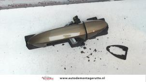 O89320 Gebruikte deurgreep 4deurs links-achter Ford Fiesta