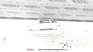 O80414 Gebruikte portiergreep 4deurs links-voor Honda Insight