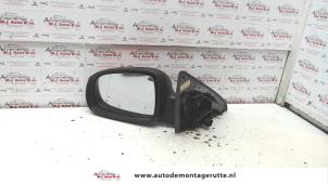 O84367 Gebruikte buitenspiegel links Opel Tigra