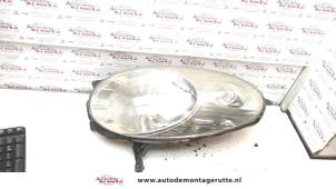 O72427 Gebruikte linker koplamp Nissan Micra