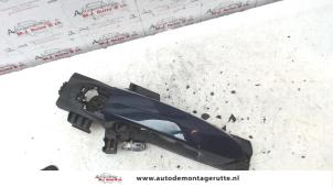 O79606 Gebruikte portiergreep 2deurs links Ford Fiesta