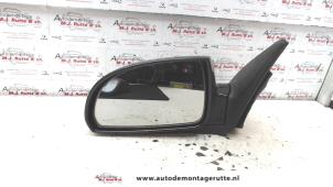 O85045 Gebruikte buitenspiegel links Kia Rio