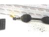 Gebruikte Aandrijfas links-voor Opel Astra O111002