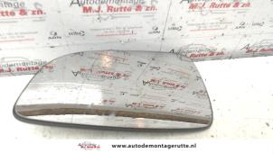 O85897 Gebruikte spiegelglas links Opel Astra