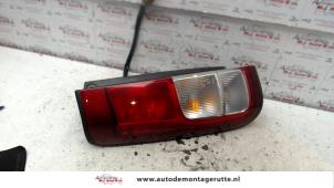 O94178 Gebruikte achterlicht links Suzuki Ignis