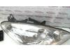 Gebruikte Koplamp rechts Peugeot 1007 O74165