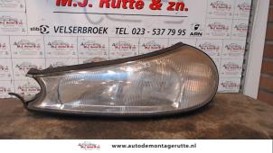 O71809 Gebruikte koplamp links Ford Mondeo