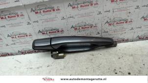 O89480 Gebruikte deurgreep 4deurs links-achter Mitsubishi Outlander