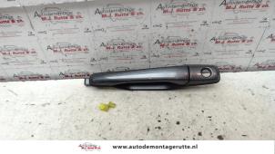 O80409 Gebruikte portiergreep 4deurs links-voor Mitsubishi Outlander
