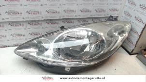 O72690 Gebruikte koplamp links Peugeot 1007